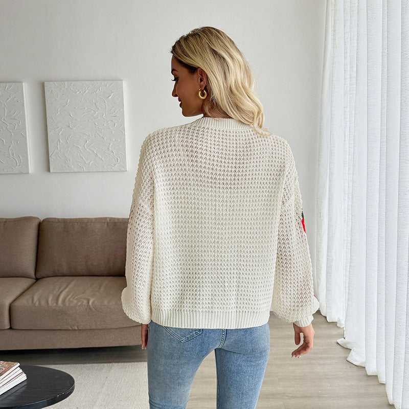 Krótki sweter damski z dekoltem w serek i guzikami